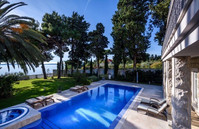 Luxury Seafront Villa Castello Split with private heated pool, Jacuzzi and sauna at the beach in Split