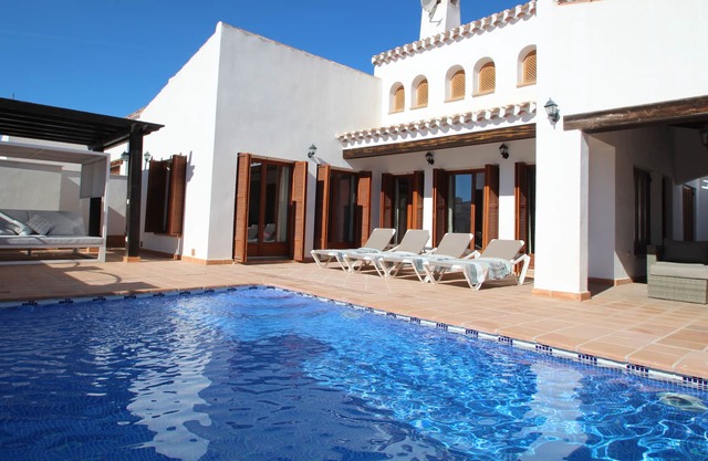 Luxury three bedroom detached villa with private HEATED pool and WiFi Internet