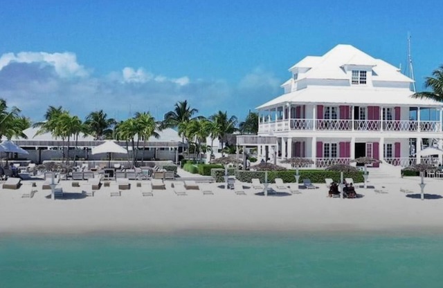 Luxury townhouse in gated community steps away from the beach and pool