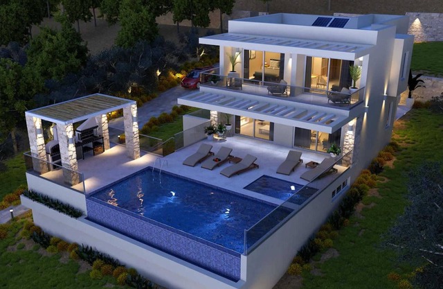 Luxury villa, coastal setting, sea views.