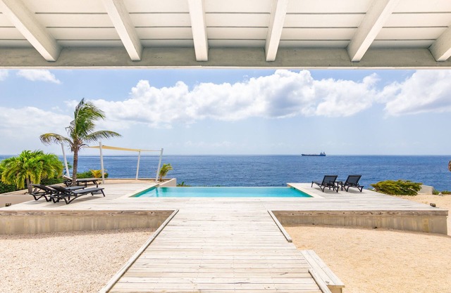 Luxury villa right by the sea with private beach.