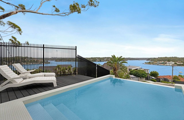 Luxury Waterside Sanctuary with pool, sensational views, 2 decks & lift!