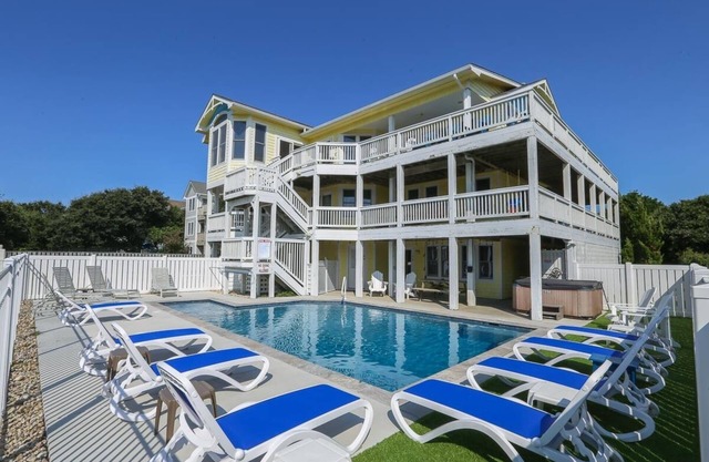 Magnificent oceanside home with pool, game room, elevator, steps to beach