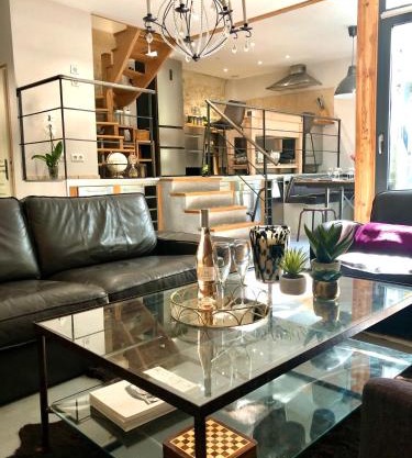 Magnifique LOFT Appartement Chalet Climatisé Buttes Chaumont