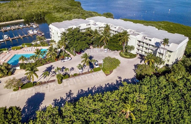 Marina views, heated pool, hot tub, short walk to the beach