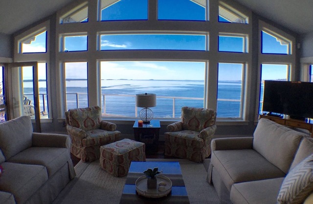 Marvel at panoramic ocean views from newly renovated oceanfront home near Camden
