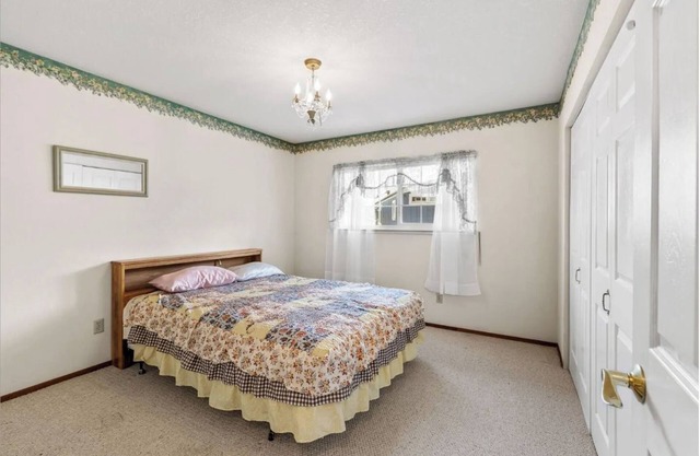 Master bedroom with two queen bed