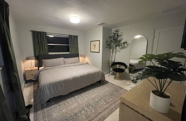 Midcentury Rambler with large backyard and open patio.