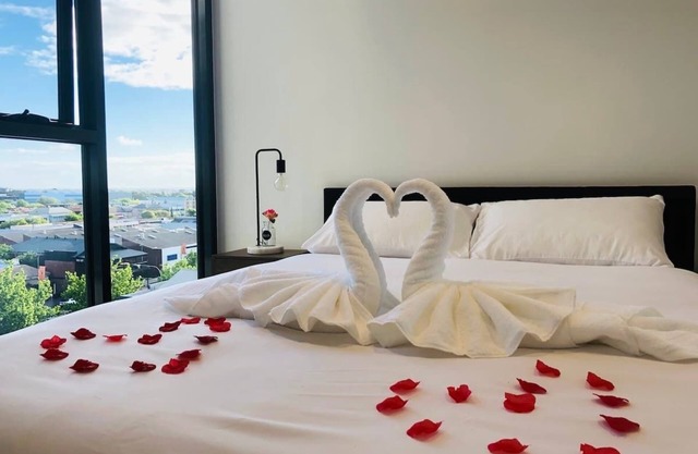 Modern 2BR City Apartment with Pool & Gym