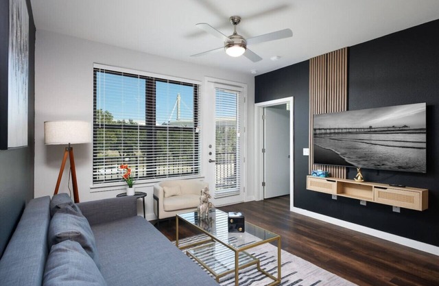 Modern 2BR Retreat w Gym&Parking Near Rvrwalk&Dome