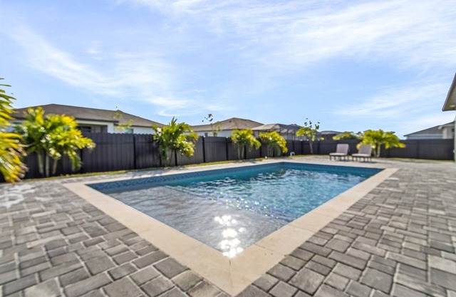 Modern 4-bed home with private heated pool, outdoor bar and grill in Cape Coral!