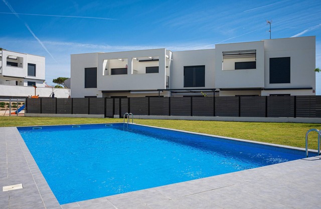 Modern Apartment 150m from Beach with Pool & Parking