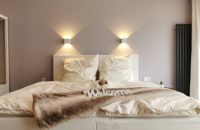 Modern apartment, private terrace, quiet location in the historic backyard