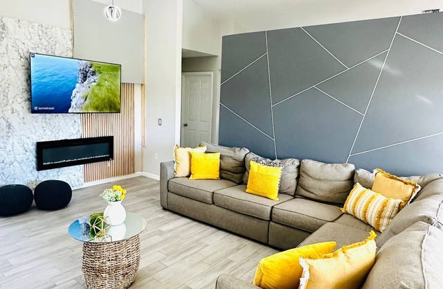 Modern luxury Beach house w/free heated pool seating in half acre lot and canal