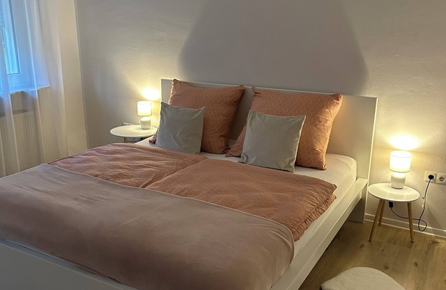 Modern vacation apartment with balcony - only 1 min. to the outdoor pool, for up to 4 guests