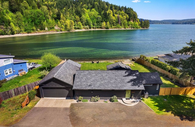 Modern Waterfront Escape with Grill, Patio, and Nature Views