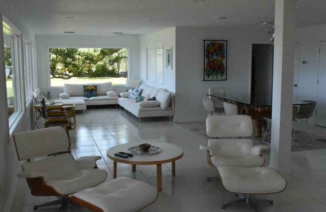 Modern waterfront home on spacious wooded lot. Sleeps 6.