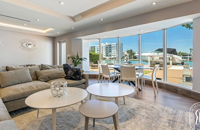 Modern Waterfront Villa in the Heart of Surfside with heated pool on the bay