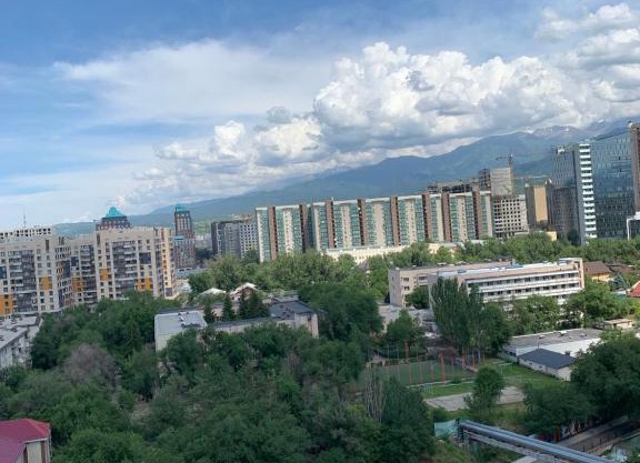 Mountains and River view apartment in Almaty