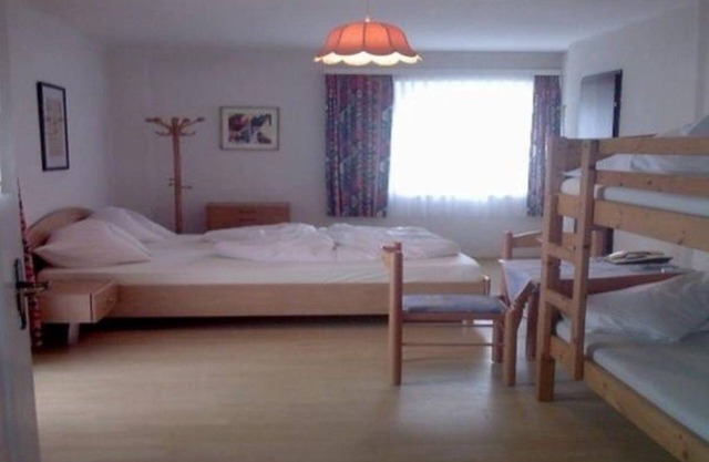 Multi-bed room with west-facing balcony - Strandhotel Pichler