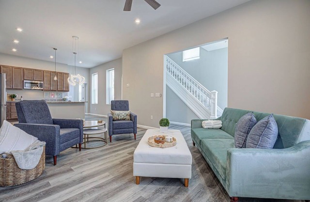 Musketeer Manor ~ 5 bedrooms & 4.5 baths off street parking & central location!