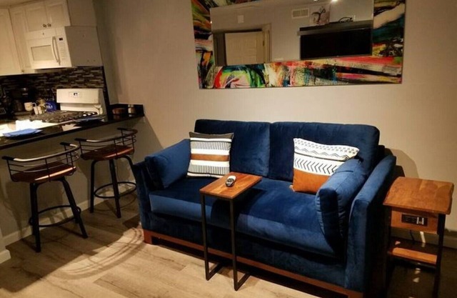Nchanted 1BR Luxury Retreat near Airport and Sports Complex w/Yard and Parking