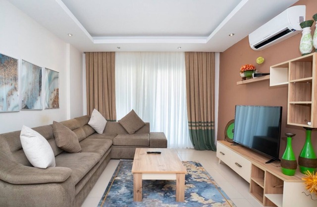 NEAR THE SEA IN A LUXURIOUS COMPLEX IN ALANYA