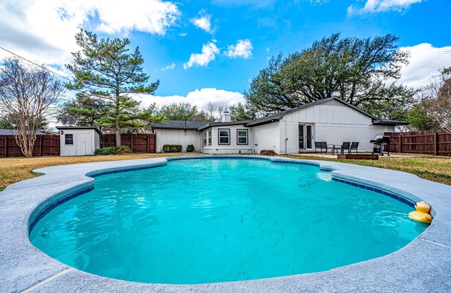 NEW! Gorgeous recently remodeled 4-bedroom spacious home with a Heated Pool .