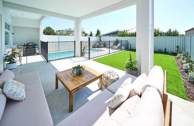 New Luxury Home with pool - Sleeps 12 walking distance to shops & beaches!