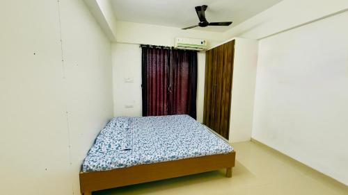 New Spacious 2BHK apartments in Tirupati Near Railway Station with fully equipped kitchen, AC bedrooms, Washing Machine, 24 hours water, caretaker service, and ample space for car parking & ideal for families and pilgrims