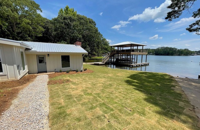 Newly renovated lakefront cabin at Lake Martin! Dock and boat ramp onsite!