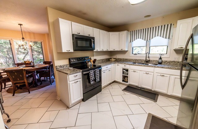 Nice Home Located Near Golf Complex Offers Many Amenities at Affordable Price!