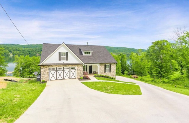 NO STEPS TO THE LAKE! BRAND NEW LAKE FRONT HOME,** SERENITY AT THE LAKE**