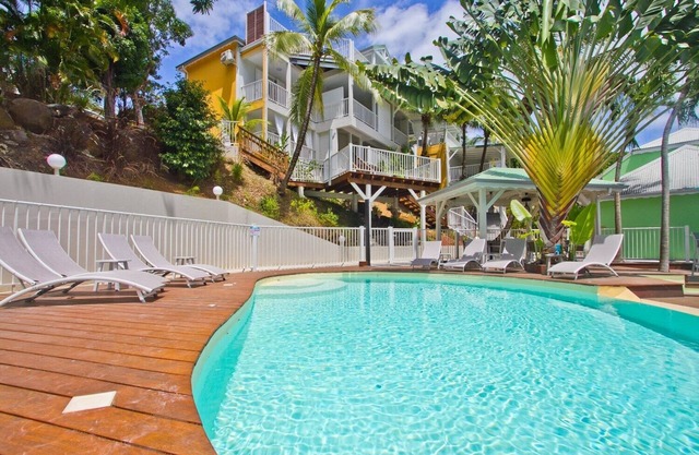 "O Coeur de Deshaies", Papaya Duplex. Room with sea view. A/C, swimming pool.