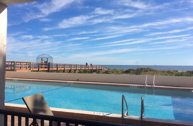 Ocean Front 1 Bedroom Condo With Heated Pool just outside the balcony
