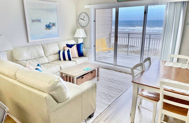 Oceanfront condo with direct beach access, pool, and elevator