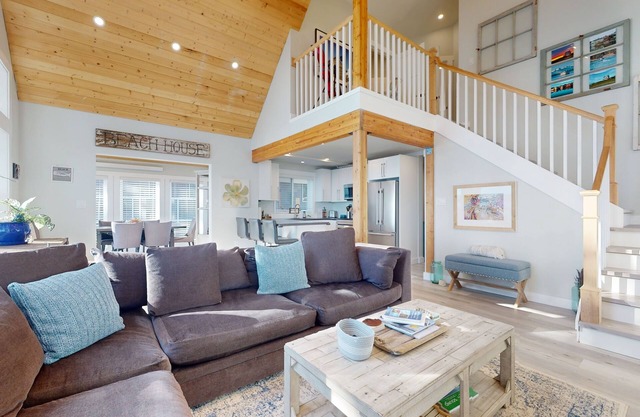 Oceanfront getaway with sprawling deck, gas grill, mountain views and W/D