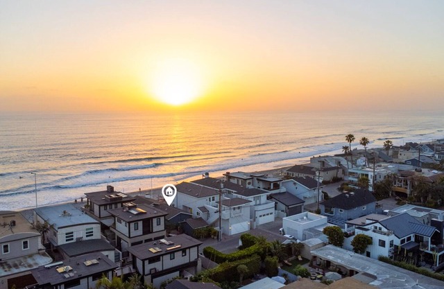 Oceanfront sanctuary nestled on the sand in the heart of Del Mar's Beach Colony