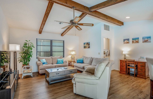 One-level home in quiet location with private pool, central AC & open layout