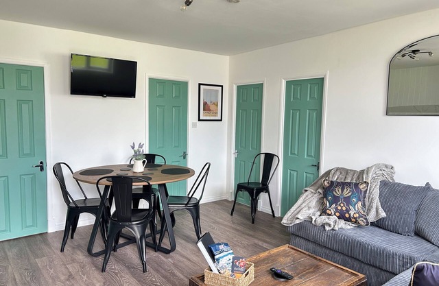 Our cosy chalet is just a 5-minute stroll from the golden sands of Camber Beach.
