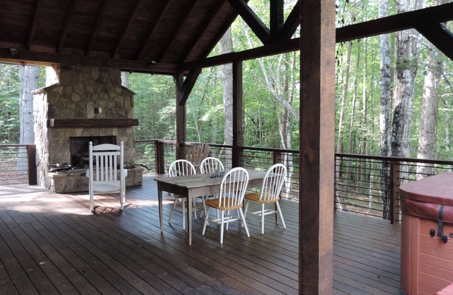 Outside party deck w/fireplace on Fightingtown Creek!