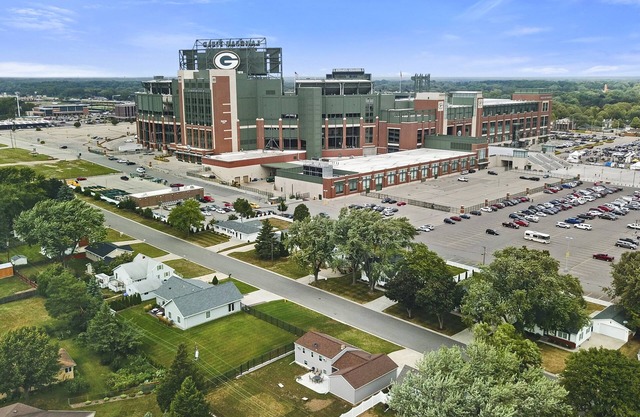 Pack Shack 3 in the shadows of Lambeau Field nnINQUIRE ABOUT NFL DRAFT PARKING!