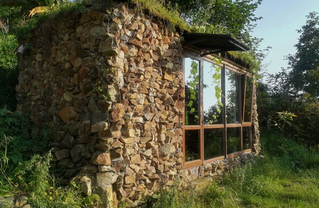 Panoramic sea view tiny house with a lawn