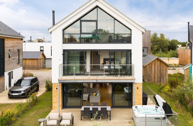 Pass the Keys | Minety Lake lodge | hot tub | games room