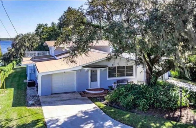 Peaceful 3 bedroom lake front home on 1 acre