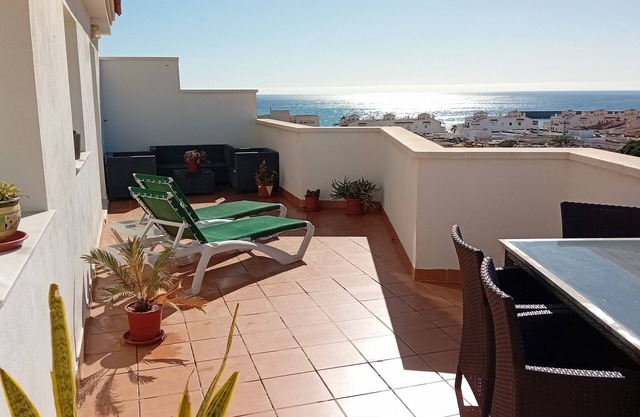 Penthouse next to the Romanilla Beach, dream terrace