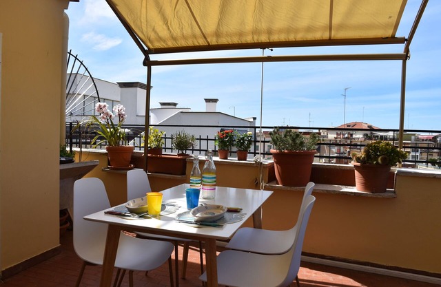 Penthouse overlooking the rooftops of Anzio's historic buildings, downtown but within walking distance of the beach.