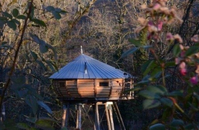 Perched hut located near a river