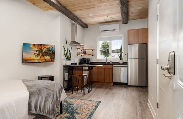 Pine Beam Elephant Studio next to Blue Line