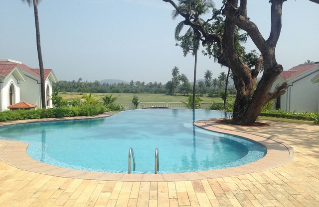 Pool Facing Fully Furnished Single Bedroom Apartment in Siolim
